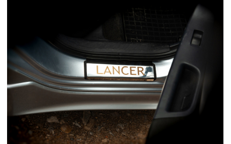Накладки на пороги Mitsubishi Lancer X