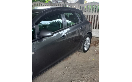 Дефлекторы окон Opel Astra J