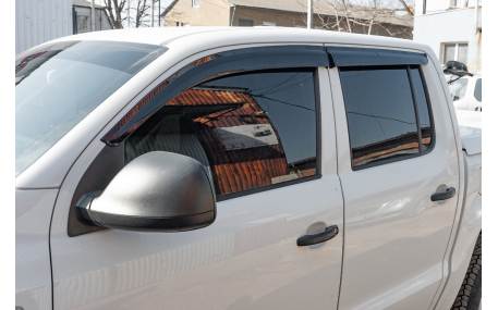 Дефлекторы окон Nissan Navara