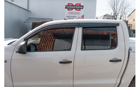 Дефлекторы окон Nissan Navara