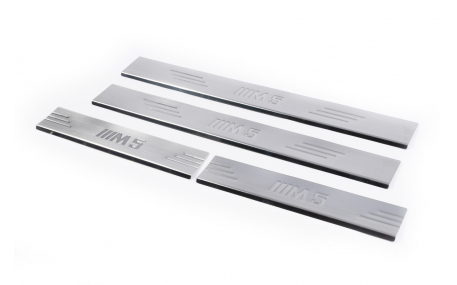 Накладки на пороги BMW E34