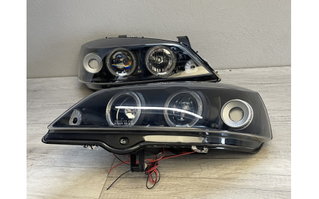 Фары передние Opel Astra G