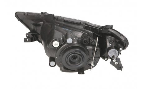 Фара передняя Mitsubishi L200