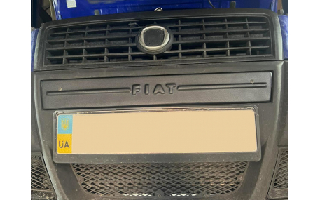 Зимняя накладка на решетку Fiat Doblo