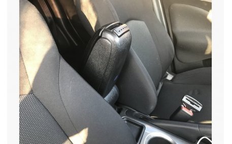 Подлокотник Skoda Rapid