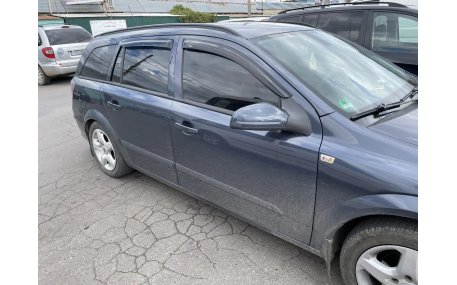 Дефлекторы окон Opel Astra H