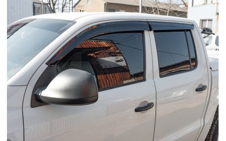 Дефлекторы окон Nissan Navara