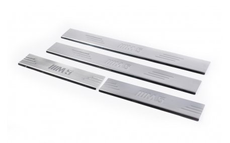 Накладки на пороги BMW E34