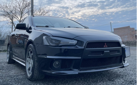 Бампер передний Mitsubishi Lancer X